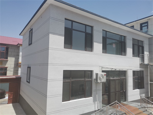 房山區自建房外墻保溫水包砂仿石漆案例